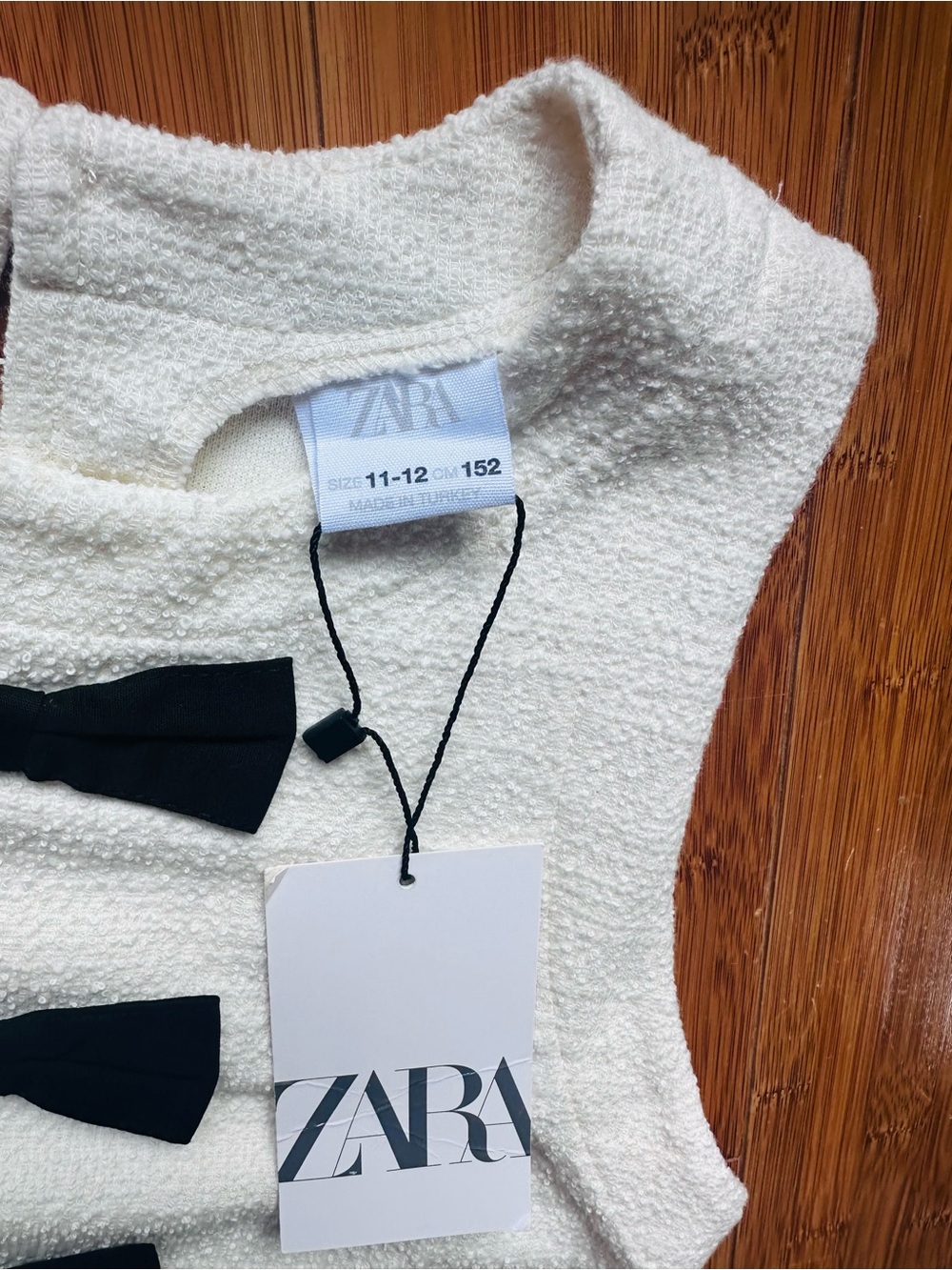 ZARA Cream Sleeveless Dress with Black Bow Accents